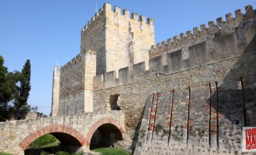 Historic hilltop castle, Castelo de São Jorge, overlooking Lisbon with Tour Map Portugal