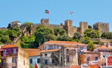 Historic hilltop castle, Castelo de São Jorge, overlooking Lisbon with Tour Map Portugal