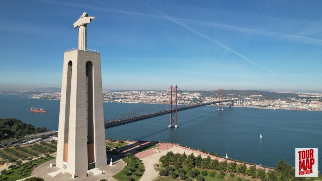 Towering Cristo Rei statue overlooking Lisbon, part of a tour by Tour Map Portugal