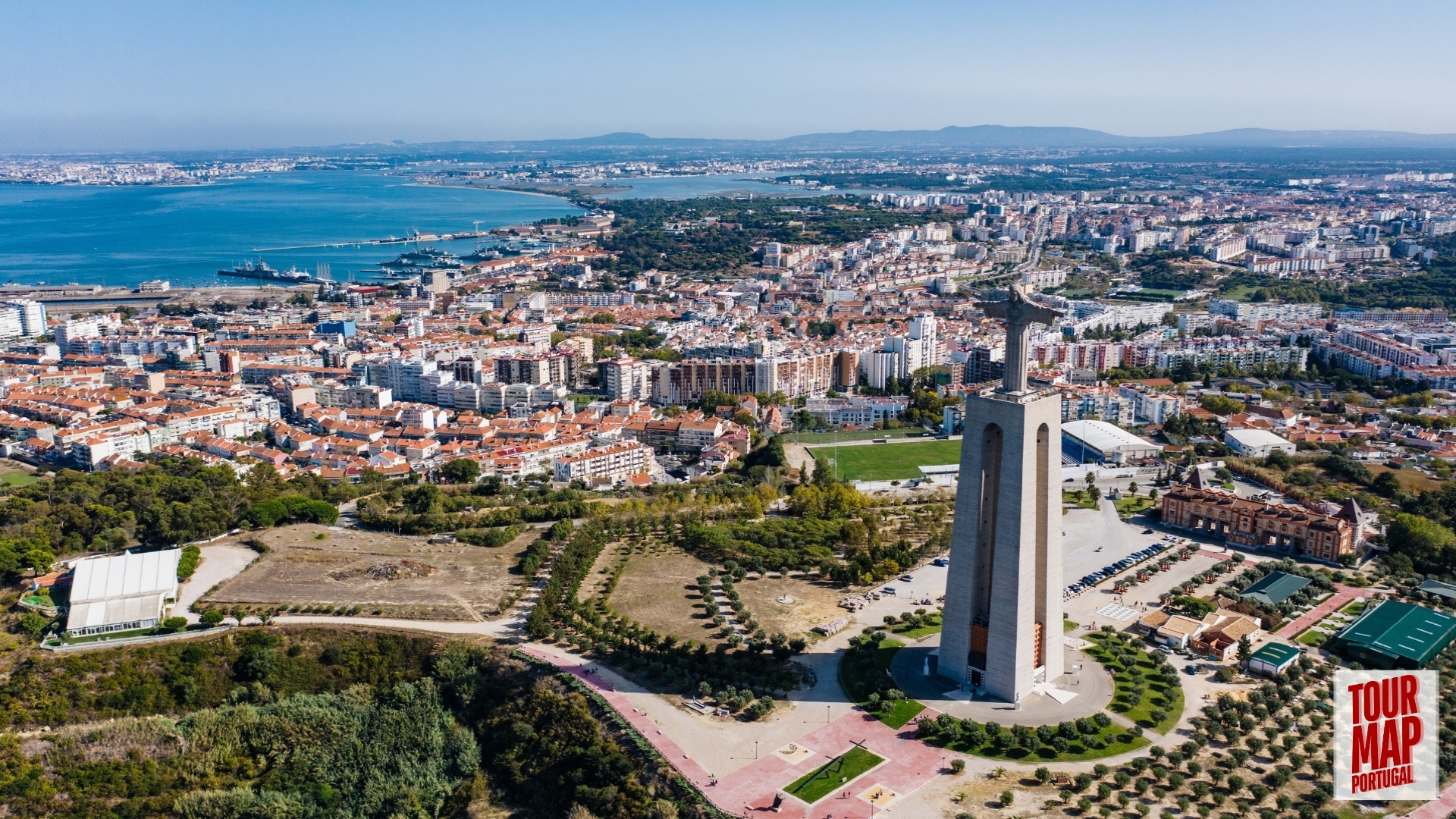 Sintra Private Day Tour offers Towering Cristo Rei statue overlooking Lisbon, part of a tour by Tour Map Portugal