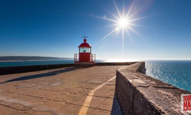 Coastal town of Nazaré, Portugal, known for giant waves and beach views with Tour Map Portugal.