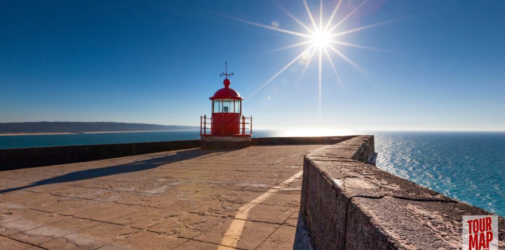 Coastal town of Nazaré, Portugal, known for giant waves and beach views with Tour Map Portugal.