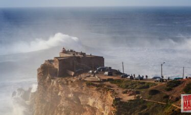 Coastal town of Nazaré, Portugal, known for giant waves and beach views with Tour Map Portugal.
