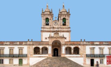 Coastal town of Nazaré, Portugal, known for giant waves and beach views with Tour Map Portugal.