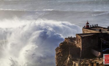 Coastal town of Nazaré, Portugal, known for giant waves and beach views with Tour Map Portugal.