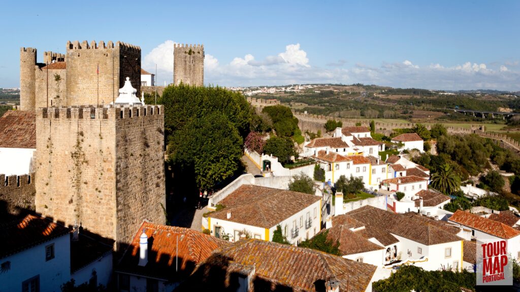 Historic town of Obidos, Portugal with scenic views and cobblestone streets on a Tour Map Portugal tour