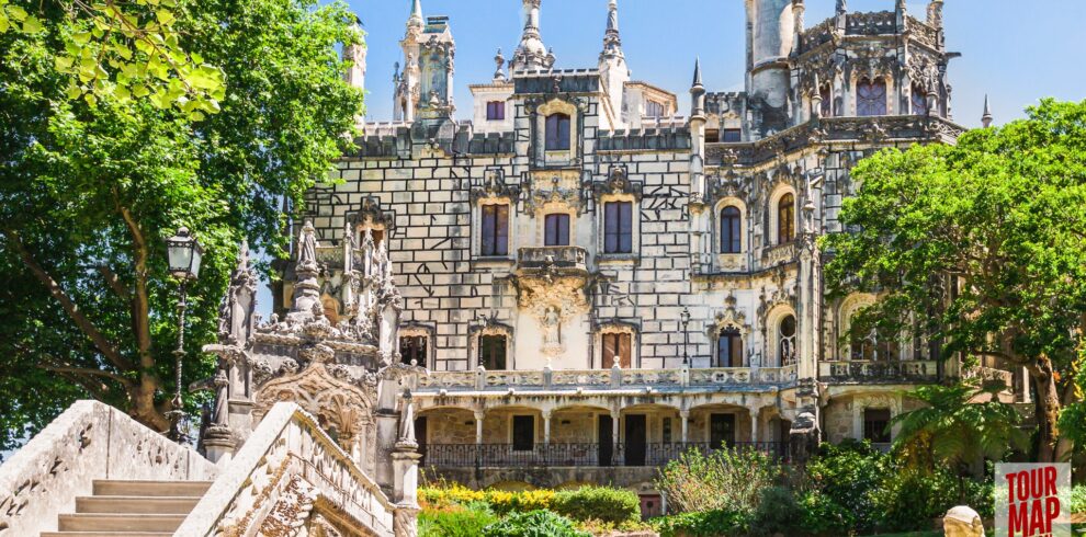 Gothic architecture and lush gardens of Quinta da Regaleira. Known for its elaborate Gothic-style architecture and enigmatic gardens, this UNESCO site is filled with hidden tunnels, lakes, and the iconic Initiation Well, offering an otherworldly experience steeped in symbolism and mystery with Tour Map Portugal.